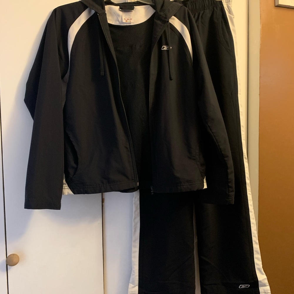Reebok tracksuit.